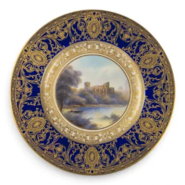 A Royal Worcester plate decorated with landscape scene of Barnard