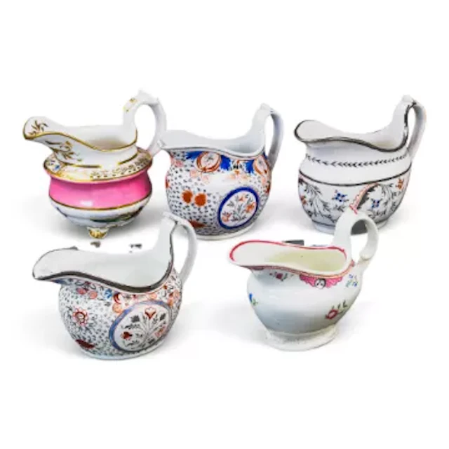 A group of 5 English porcelain 19th century cream jugs by various