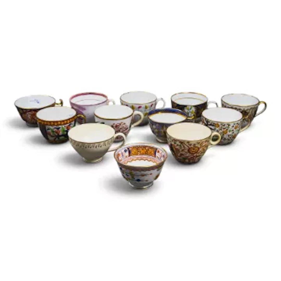 A group of 12 English porcelain 19th century tea cups by various manufacturers
