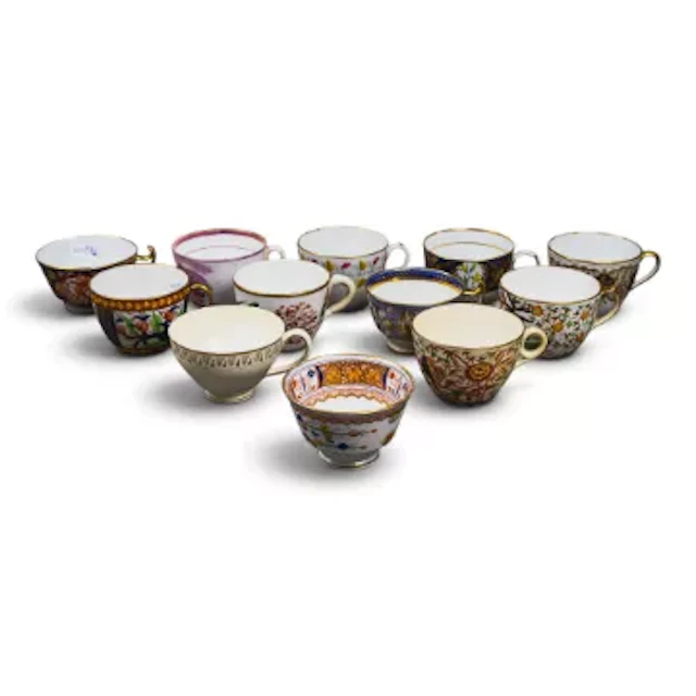 A group of 12 English porcelain 19th century tea cups by various manufacturers