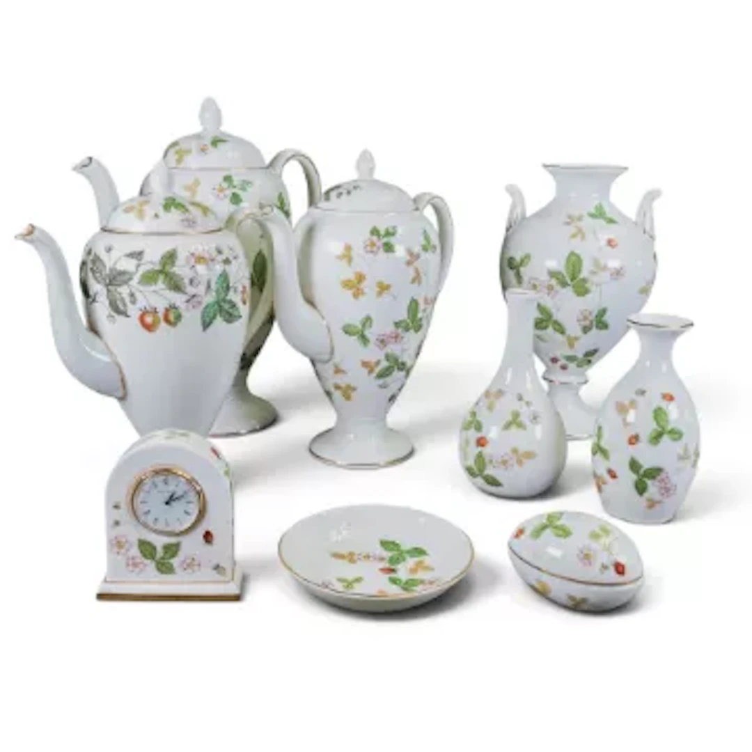 A collection of Wedgwood Wild Strawberry to include coffee pots, vases