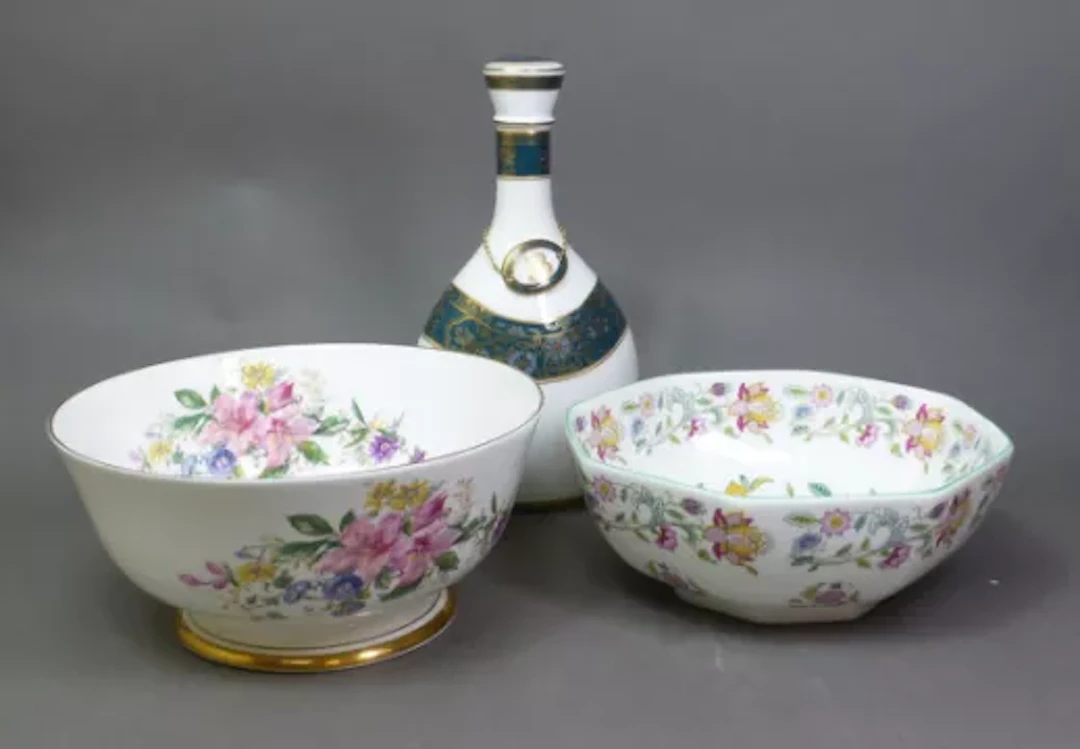 Minton Haddon Hall fruit bowl, together with a Royal Doulton Carlyle