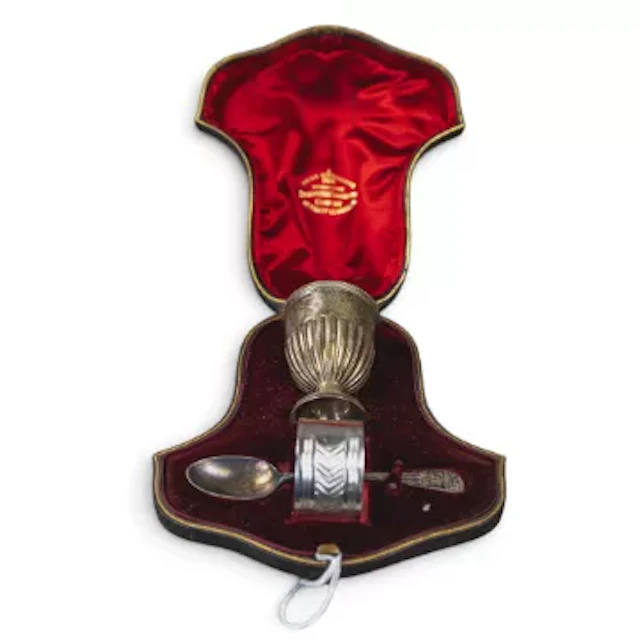 Hallmarked silver christening set, spoon, napkin ring & egg cup, cased, 73g.