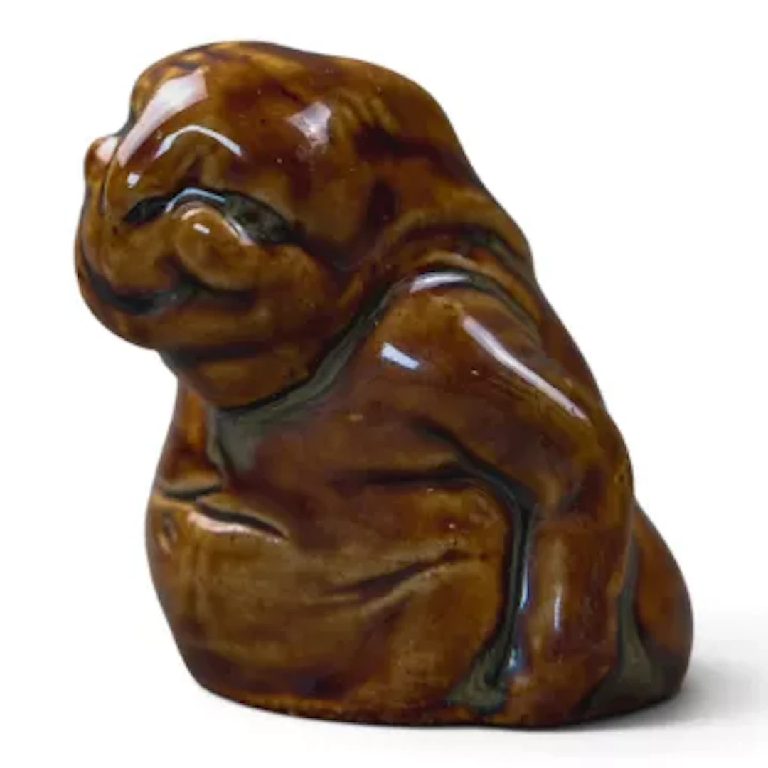 An unusual Doulton stoneware grotesque Mock Turtle figure by Mark
