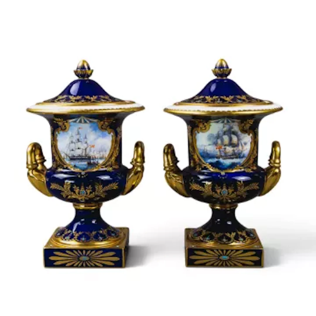 A pair of Lynton Porcelain covered urn shape vases with upswept handles