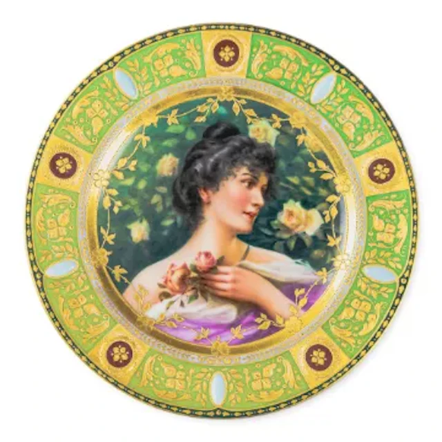 A Royal Vienna plate with a green and gilt border, with centre featuring
