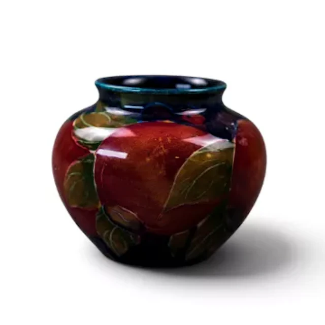 An early Moorcroft Pomegranate pattern vase, c1914, designed by William