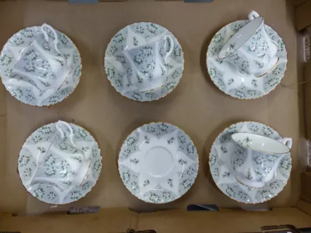 Five tea cups and six saucers in the scarce Royal Albert 'Rapture'