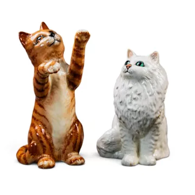 Beswick model of a ginger cat with paws up, model 1883 and seated