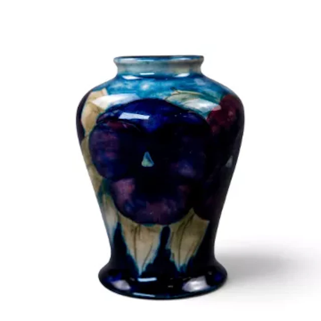 A Moorcroft vase in an early version of the Pansy design by William