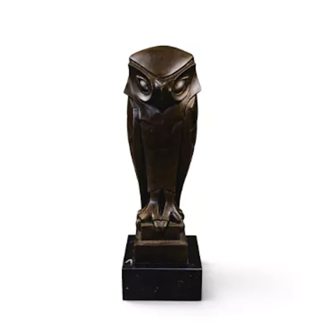 An Art deco bronze owl on a marble plinth, Paris De Bronze mark to