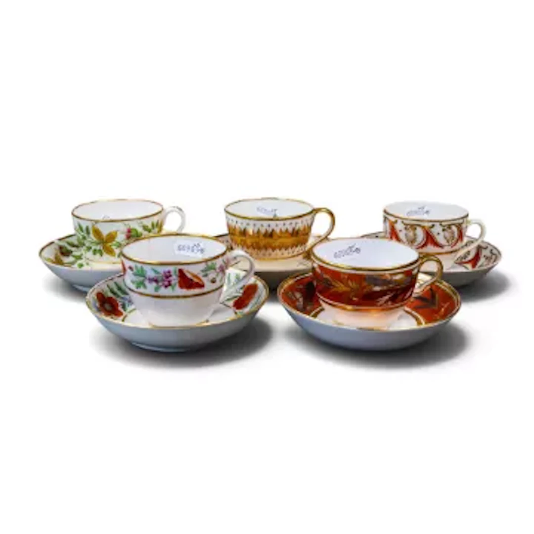 A group of five 19th century English porcelain cups & saucers, in