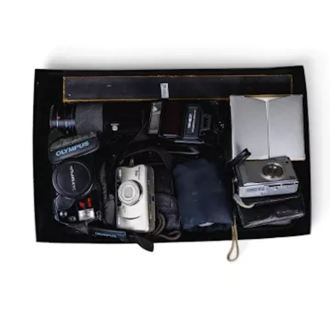 A collection of camera equipment to include Olympus AZ-300 Super Zoom