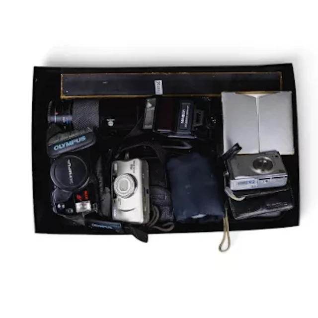 A collection of camera equipment to include Olympus AZ-300 Super Zoom