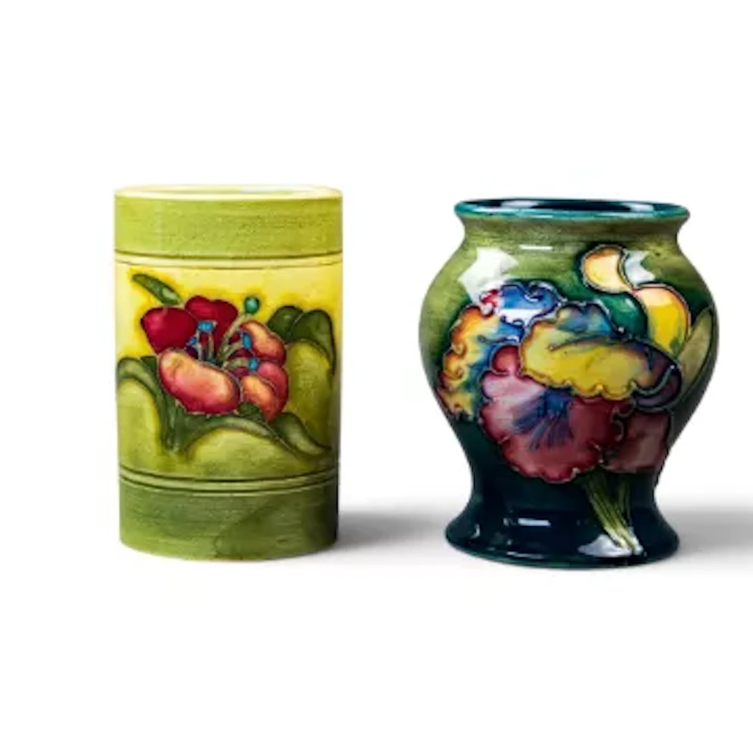 Two Moorcroft vases consisting of an Orchid pattern vase by Walter