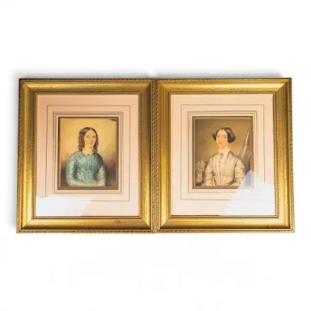 Two 19th century framed portraits both of a young woman, both wearing