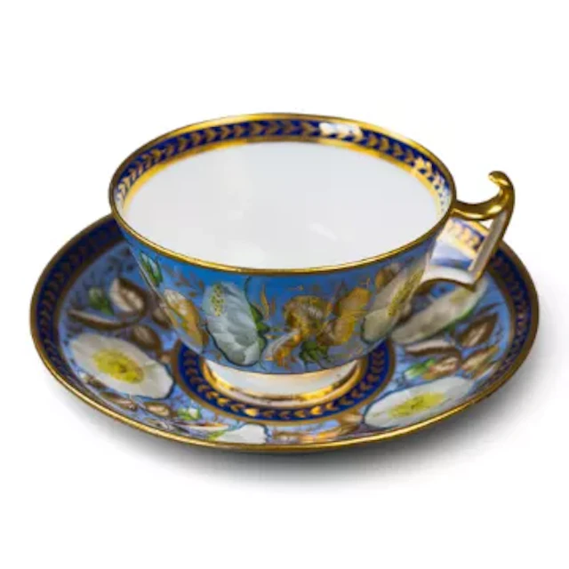 An English porcelain 19th century part service, teapot, cream & milk