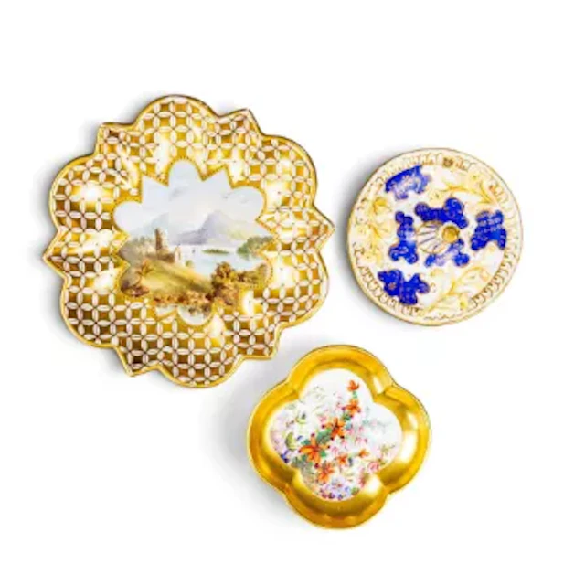 A group of three early Coalport pieces to include a ring stand with