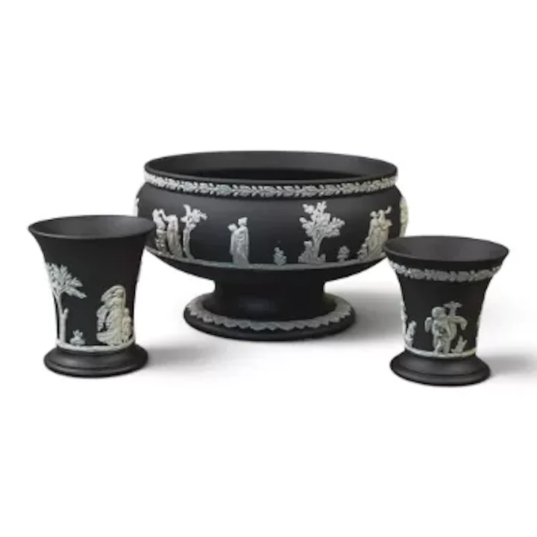 A collection of Wedgwood white on black neoclassical Jasper pieces