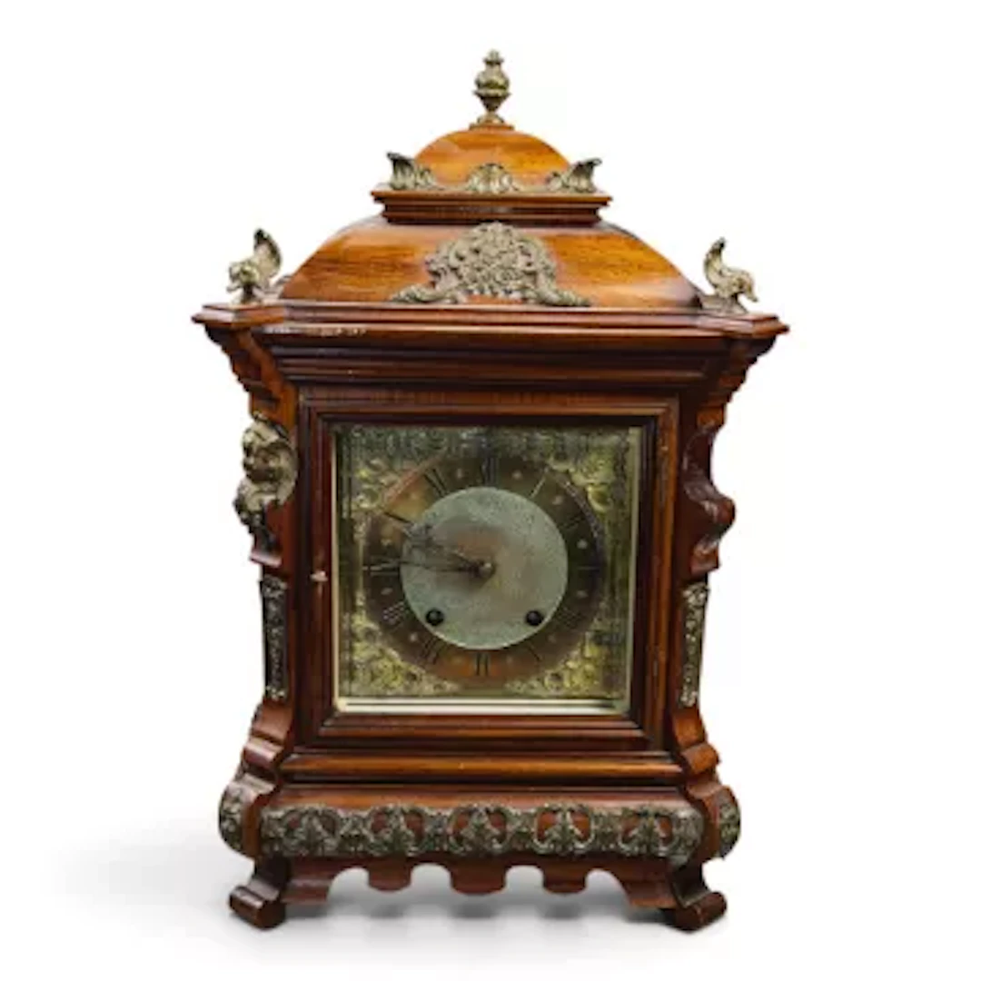 A 19th century French carved walnut mantle clock, nice quality clock