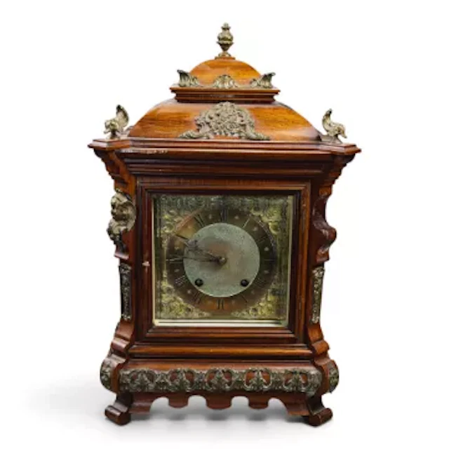 A 19th century French carved walnut mantle clock, nice quality clock