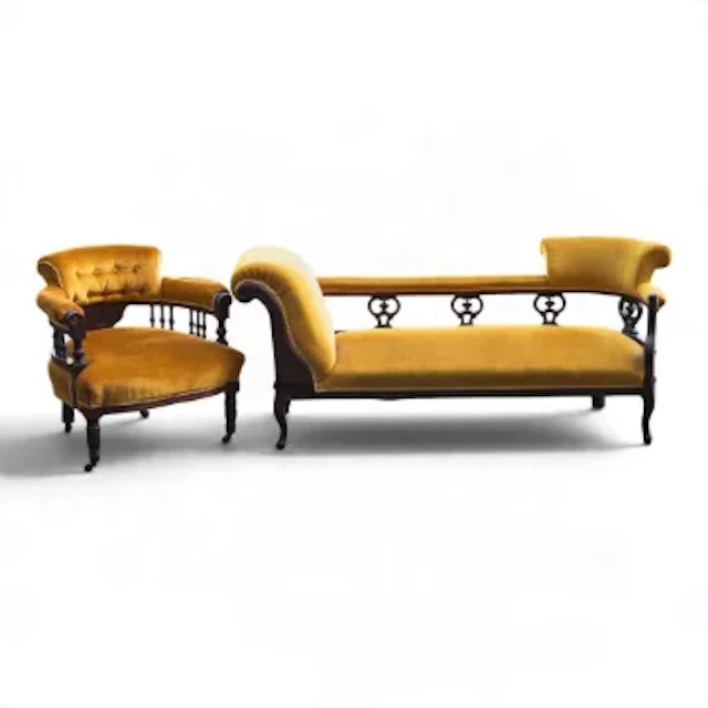 An Edwardian double end chaise longue upholstered in vibrant mustard