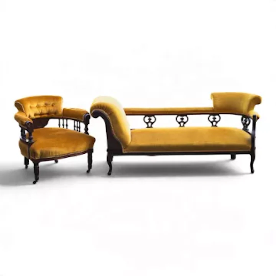 An Edwardian double end chaise longue upholstered in vibrant mustard