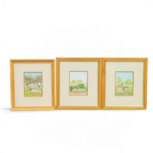 Loes AGOUST (1940), three small paintings of sheep in meadows, in