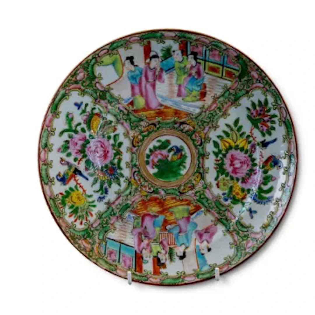 A 19th century Chinese export Famille Rose plate, decorated in 4 sections
