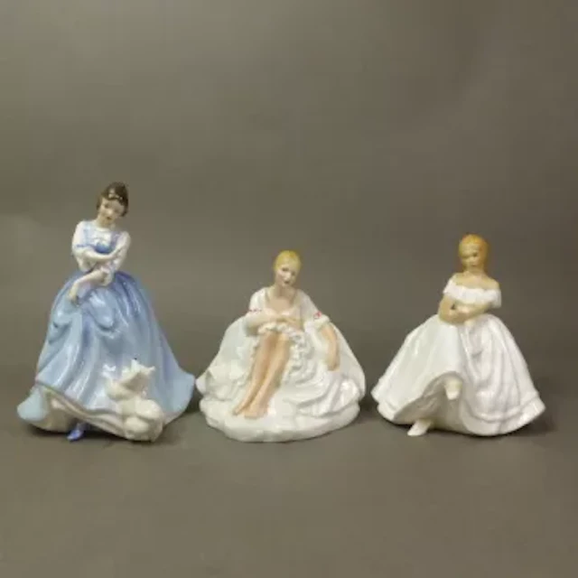 Three Royal Doulton figurines, Heather HN2956, Joanne HN2373 and Lorraine