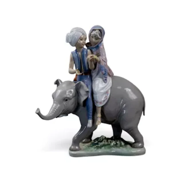 A Lladro figure 'Hindu Children' model no.5352 designed by Jose Puche