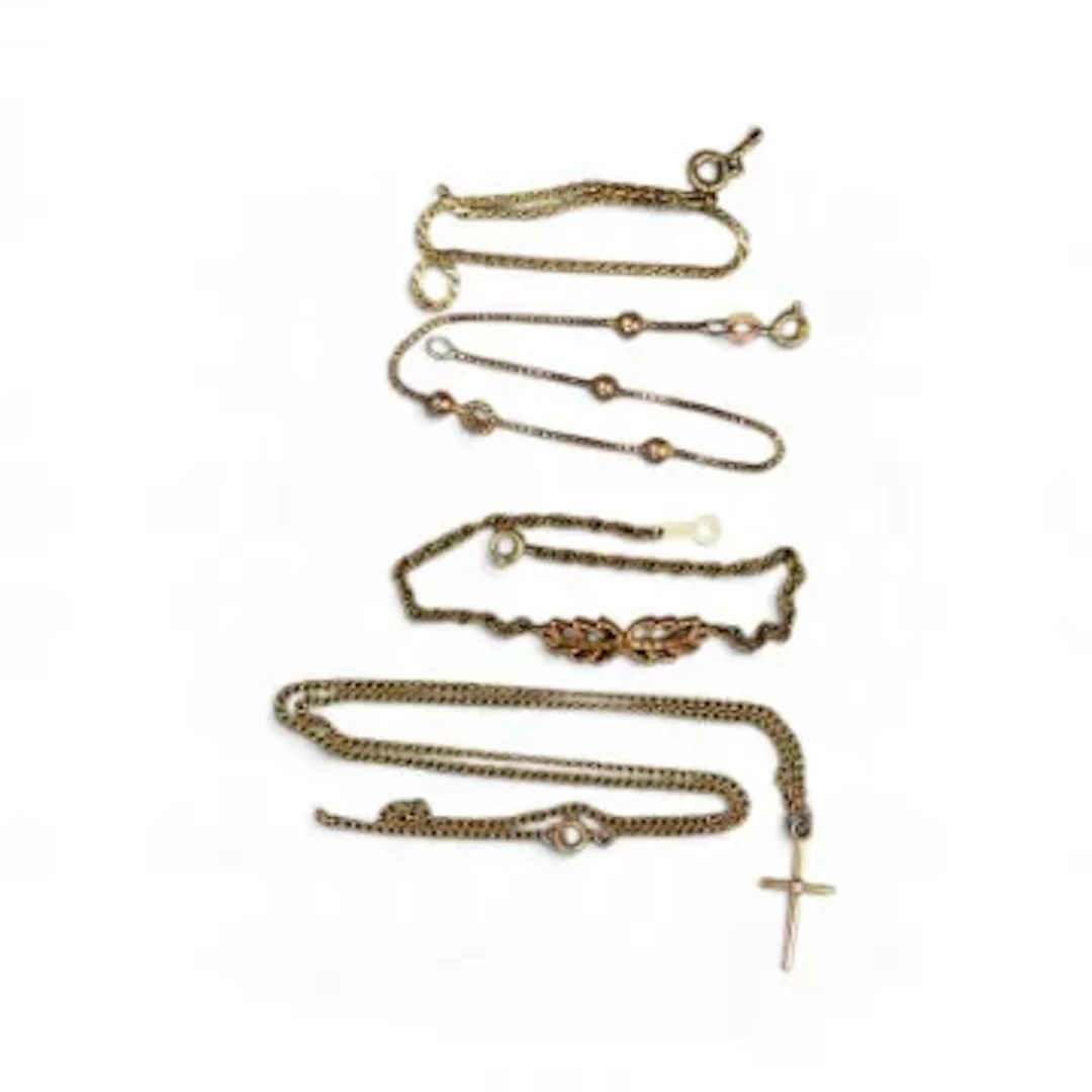9ct gold cross and chain and two 9ct gold bracelets, all broken, 7.4g.