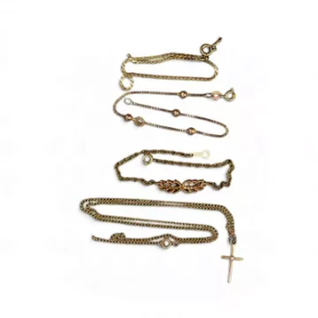 9ct gold cross and chain and two 9ct gold bracelets, all broken, 7.4g.