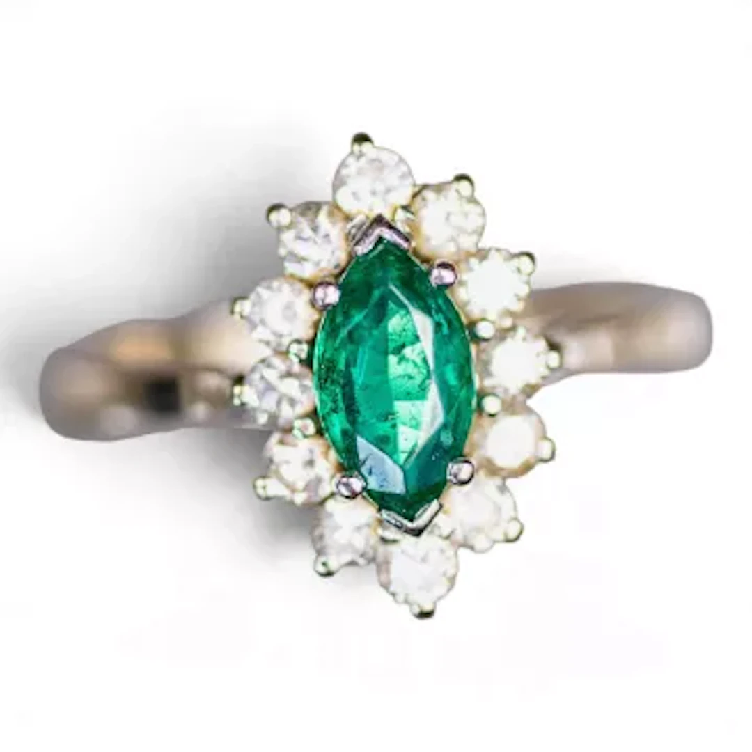 18ct white gold emerald and diamond cluster ring size N/O. Emerald