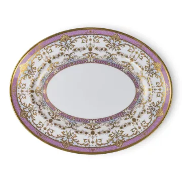 A large De Lamerie oval shaped dish decorated with a pink & gilt border