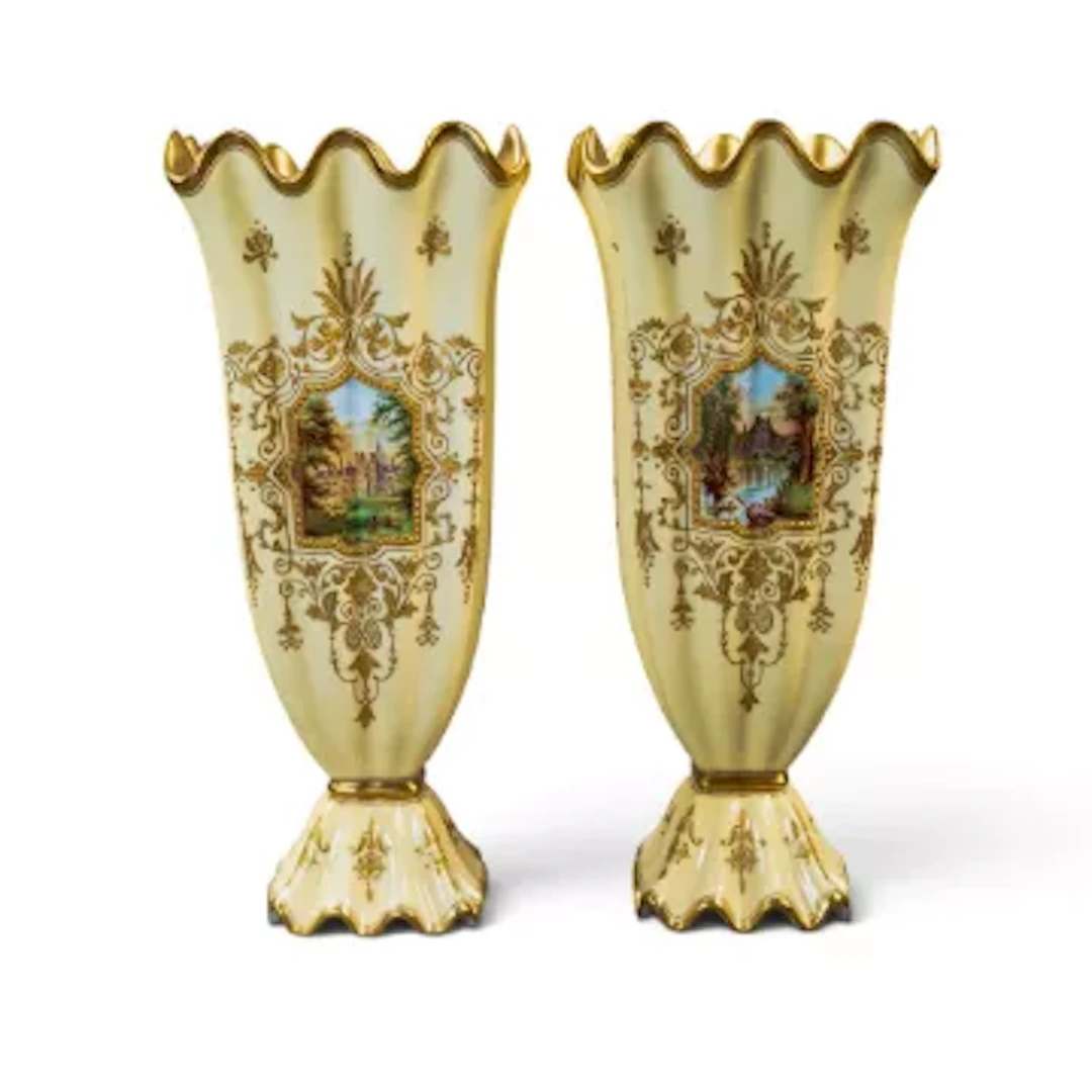 Pair of Coalport gilded shaped porcelain vases,, hand painted cartouche