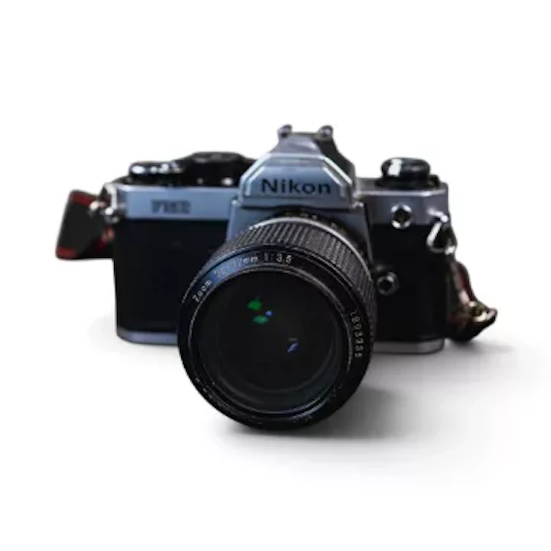 Nikon FM2 35mm SLR film camera with Nikon series E 36-72mm f/3.5 zoom lens.