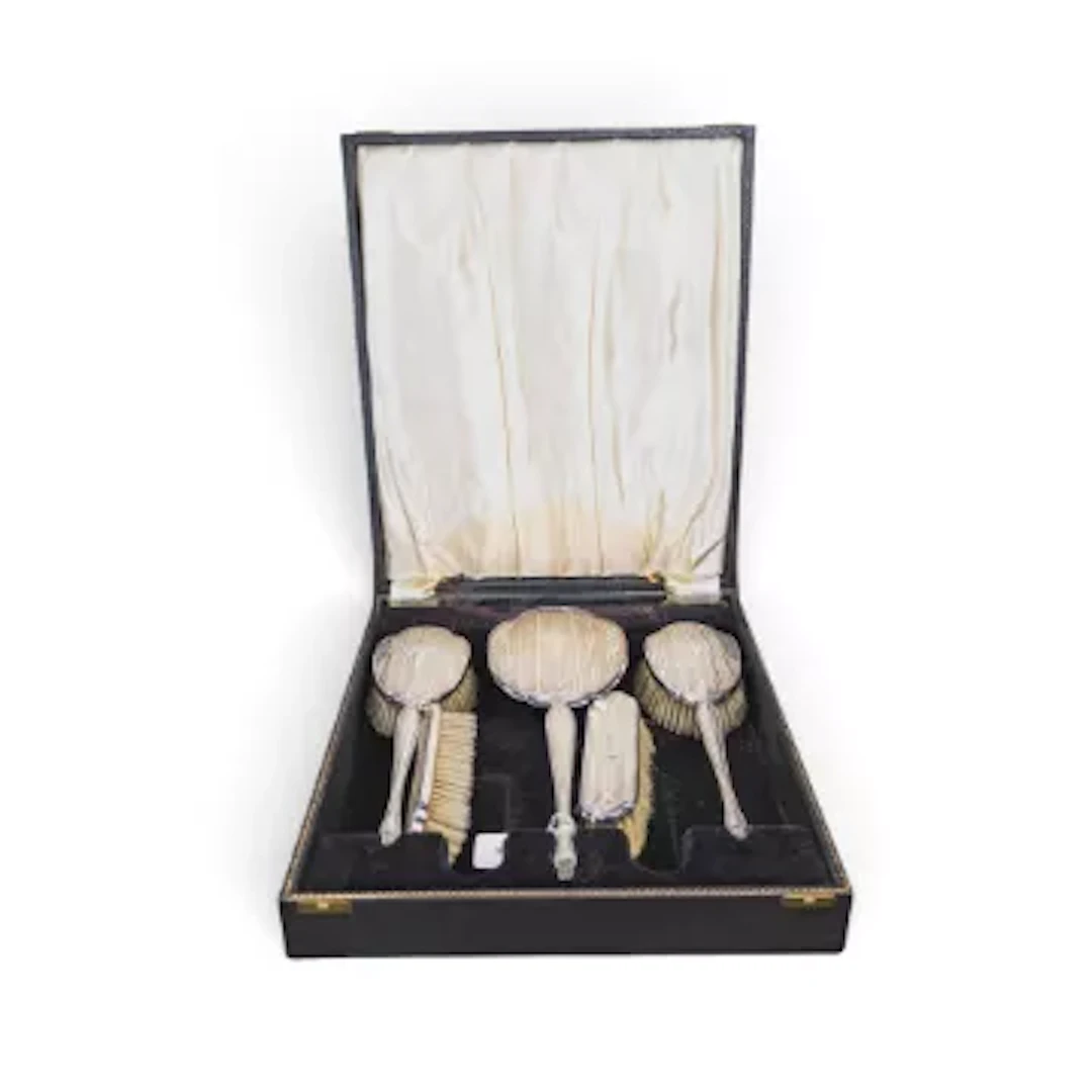 Silver backed 5 piece hallmarked silver mirror & brush set in original