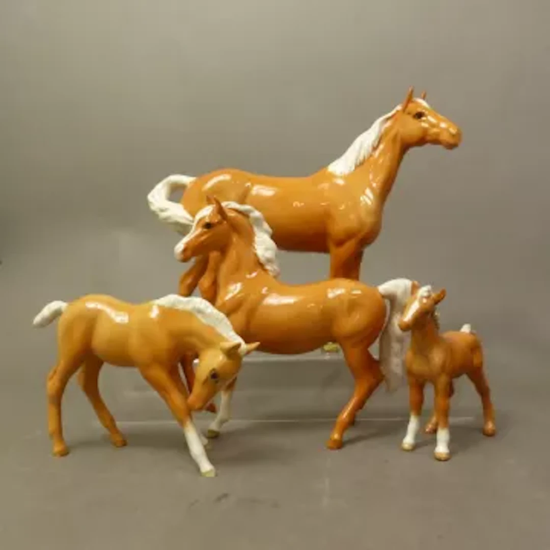 Four Beswick horse figures, all in palomino gloss, Swishtail, Prancing