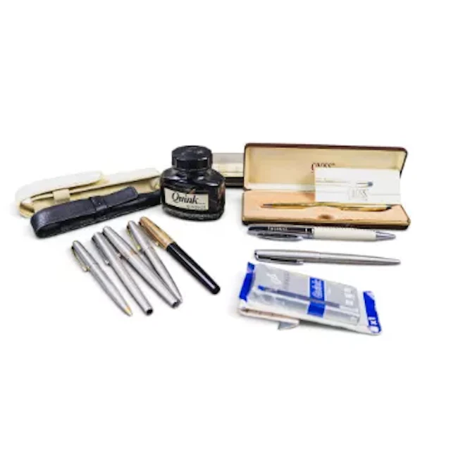 A collection of various pens, including Parker fountain x 3, ballpoint