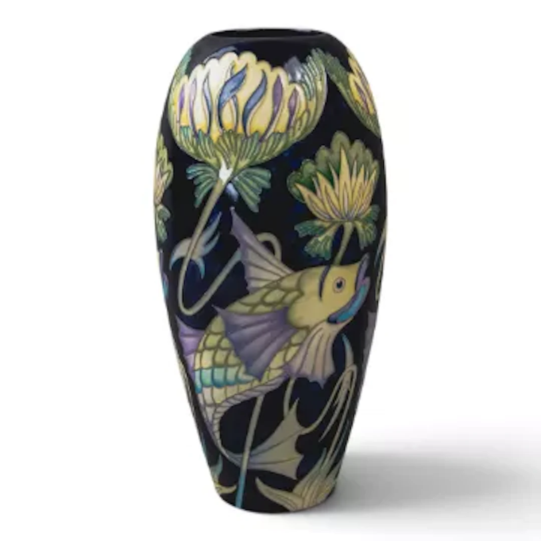 A Moorcroft trial vase with De Morgan type fish against a black ground