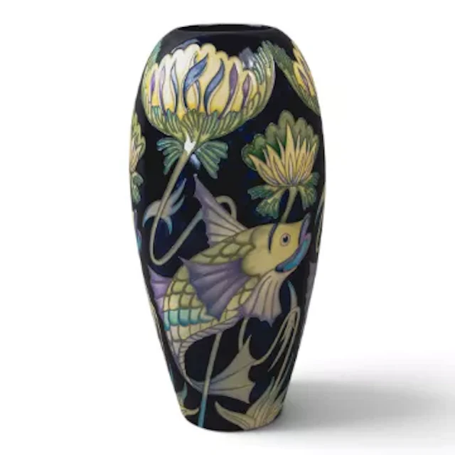 A Moorcroft trial vase with De Morgan type fish against a black ground