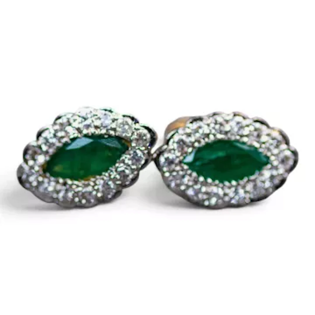Pair of 14ct white gold (electronically tested), diamond & emerald