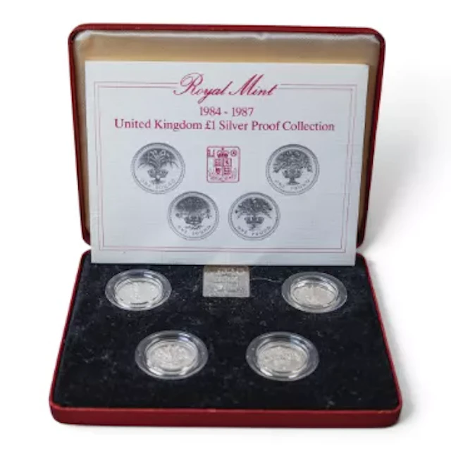Royal Mint 4 x £1 coin silver proof set 1984 - 87, boxed with COA.
