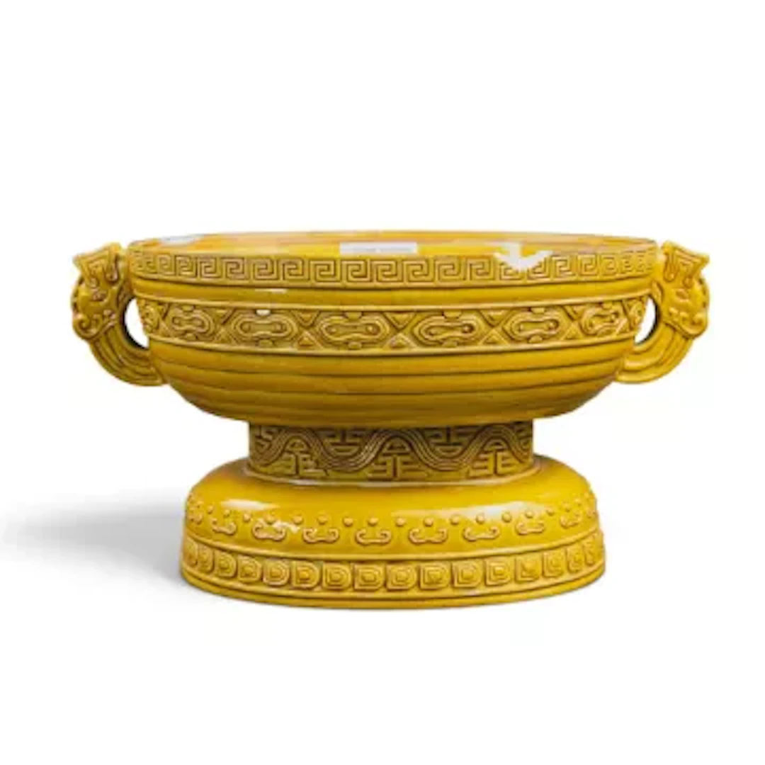 A Chinese 19th century Archaic handled footed vessel in the manner