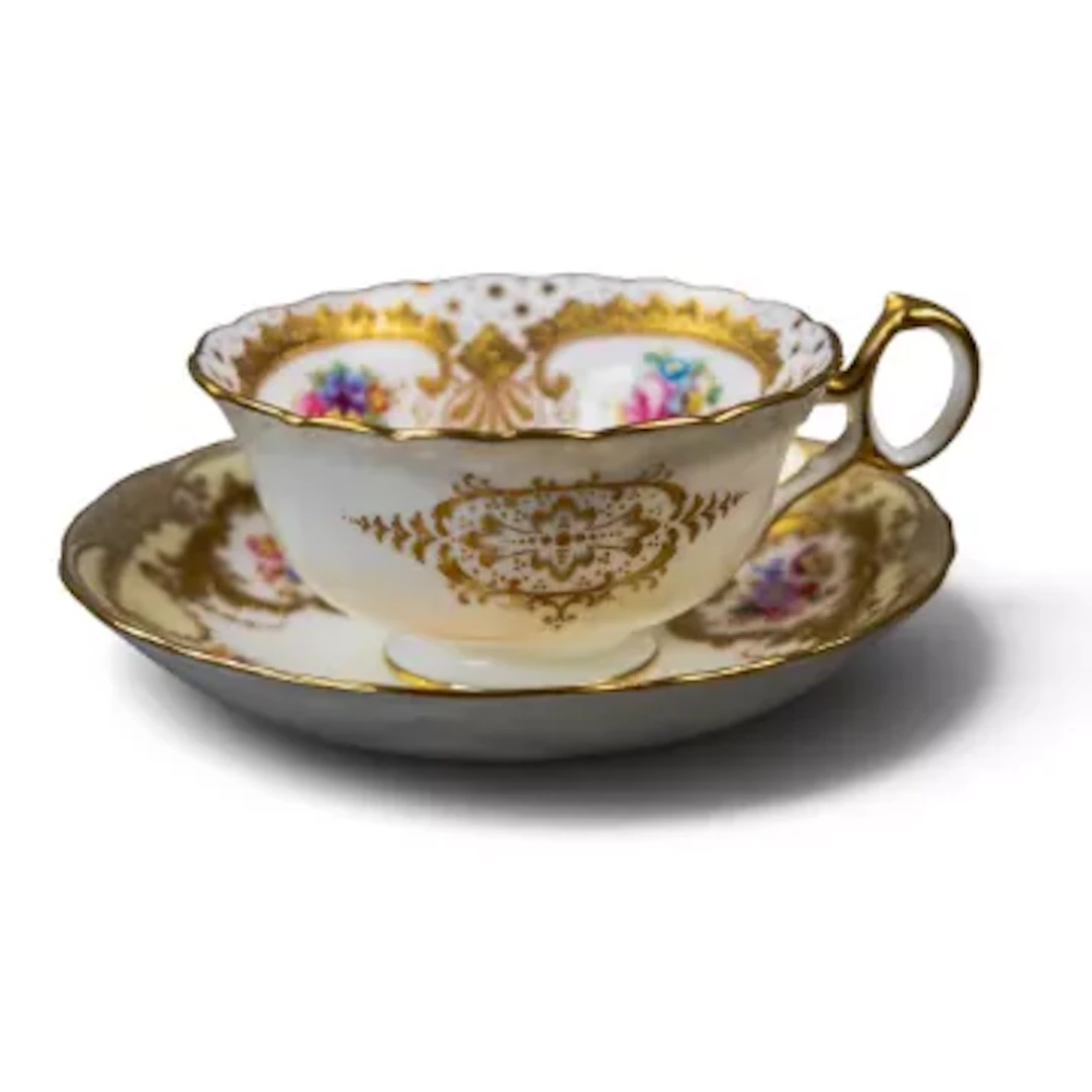 An early 20th century Cauldon tea cup & saucer, decorated with floral