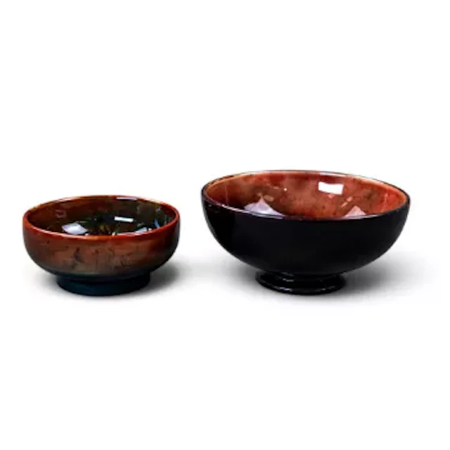 Two Moorcroft small bowls, consisting of a Spring Flowers design bowl