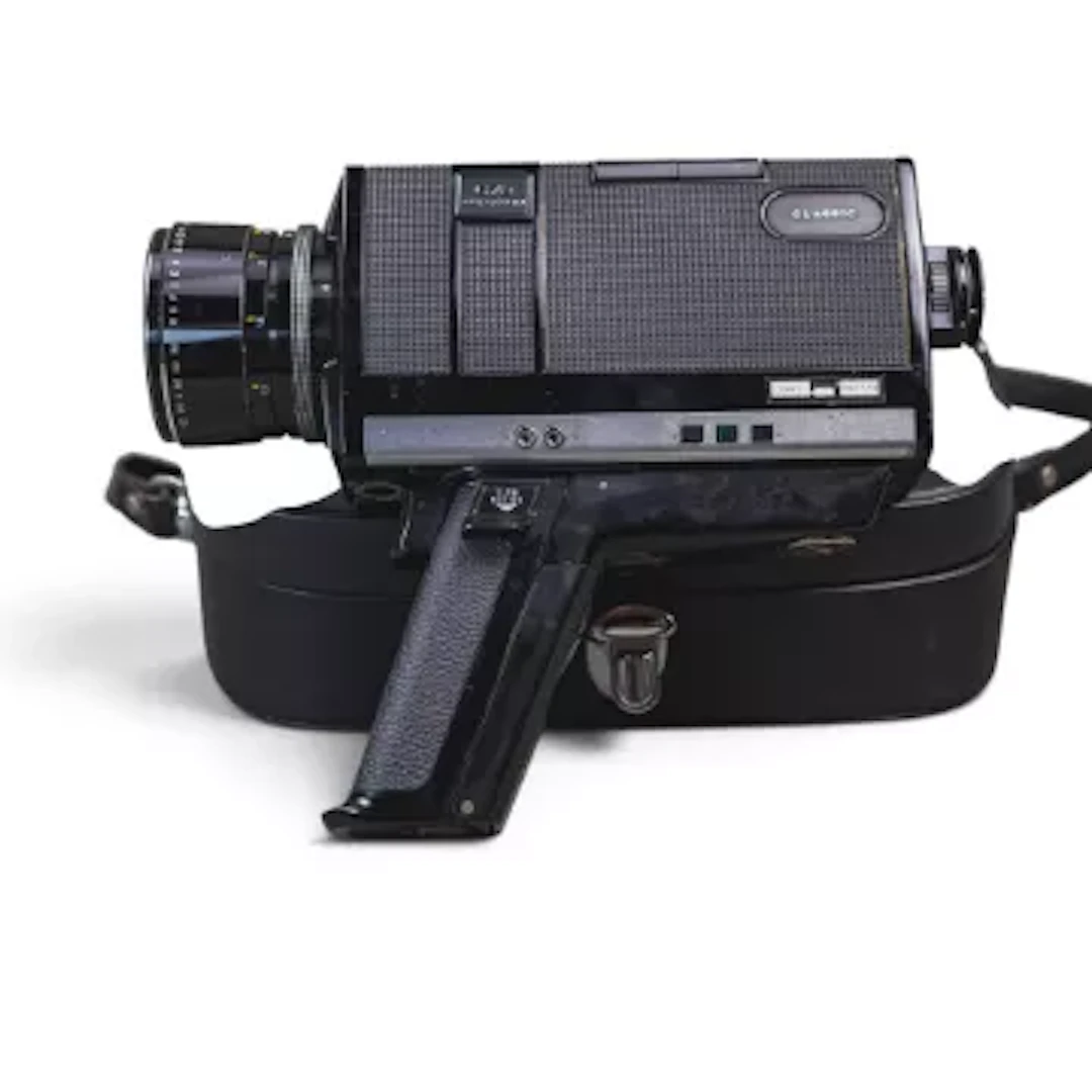Vintage Chinon 672 auto zoom super 8 movie film camera with film