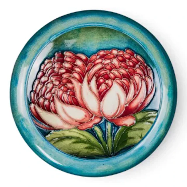 An inverted rim Moorcroft bowl in the Waratah pattern, designed by