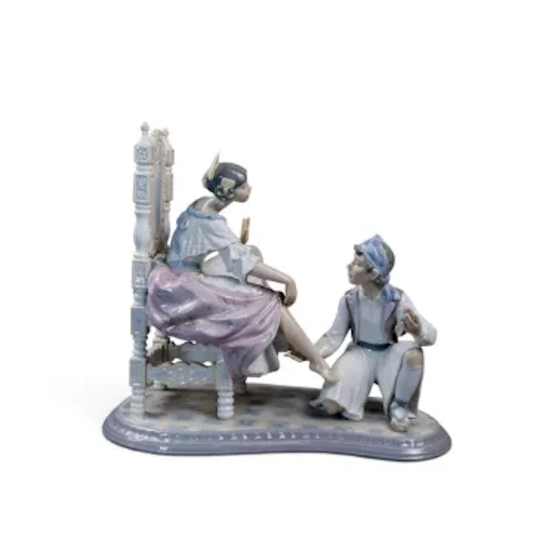 A Lladro figure group 'Allow Me' model no.6086, designed by Regino